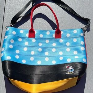 Harvey’s Disney seatbelt bag. In like new condition.